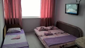 Фото номера Трехместный номер с видом на море Апартаменты U Samogo Sinego Moria г. Затока 4