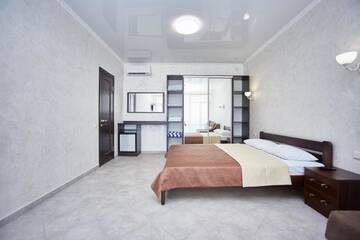 Фото номера Роскошный четырехместный номер Отель GRAND Hotel г. Затока 4