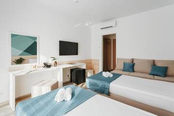 Фото номера Семейный номер с балконом, вид на аквапарк Курортные отели Hotel Aquapark Zatoka г. Затока 3