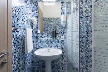 Фото номера Семейный номер с балконом, вид на аквапарк Курортные отели Hotel Aquapark Zatoka г. Затока 2
