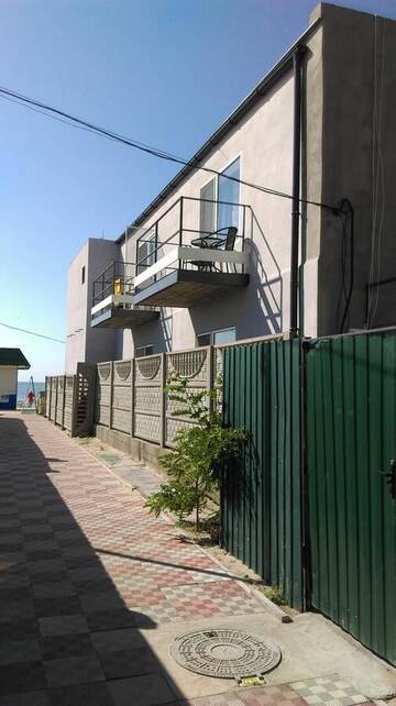 Фото номера Четырехместный номер с душем Гостевой дом Polish courtyard г. Затока 2