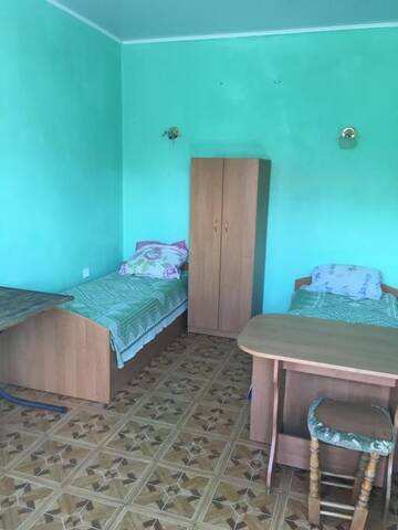 Фото номера Двухместный номер с 2 отдельными кроватями Отель Morskoy Briz Hotel г. Затока 22