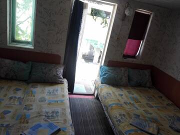Фото номера Стандартный семейный номер Хостелы Sergey Rooms г. Затока 17